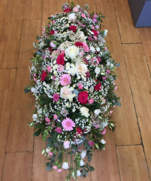 Mixed flower coffin spray pink shades