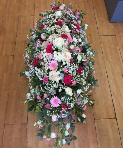 Mixed flower coffin spray pink shades
