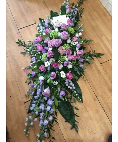 Mixed pink and lilac coffin spray